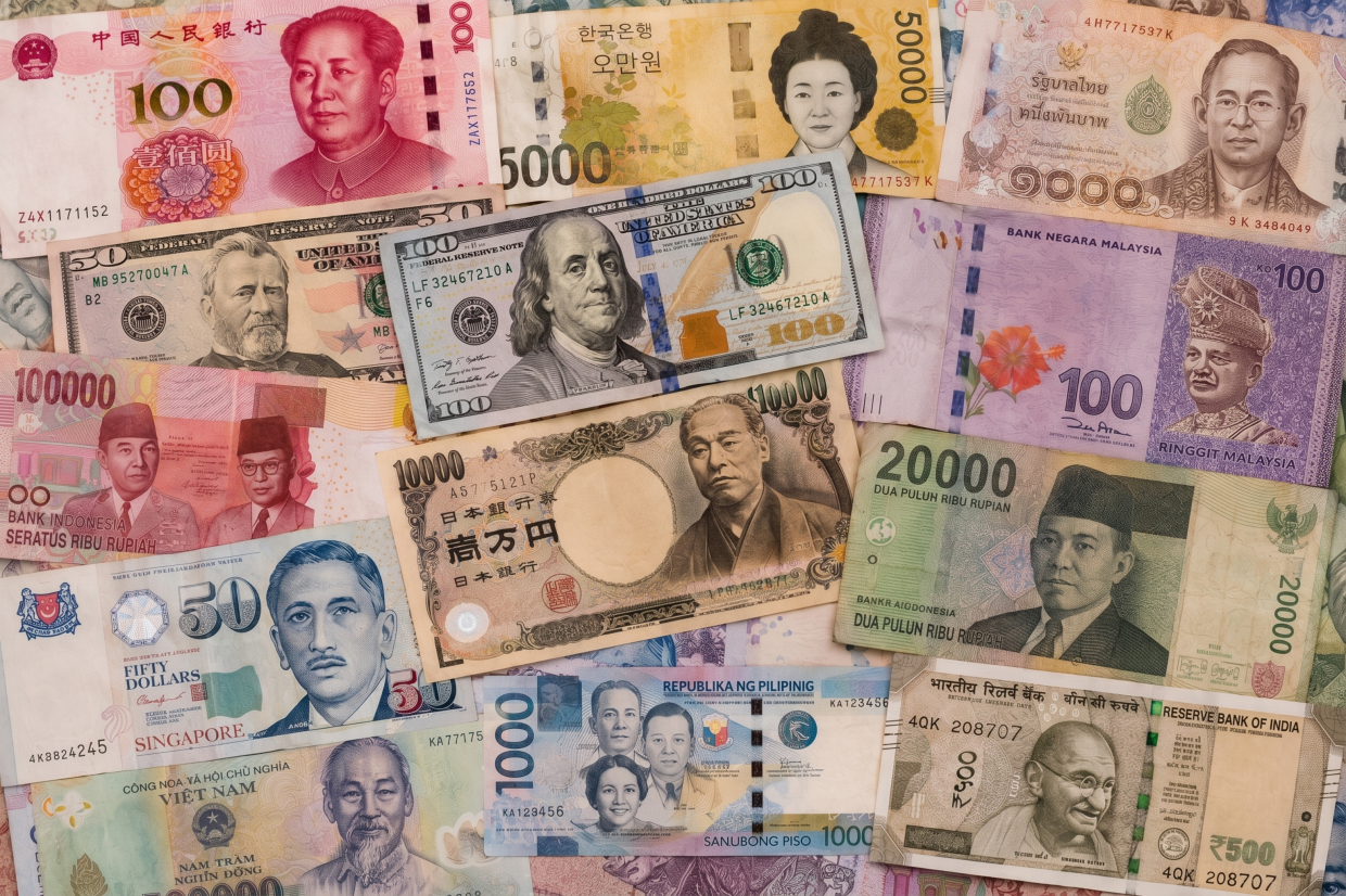 美国9月通胀高于预期引发亚洲货币走弱与韩股KOSPI重挫的新闻配图